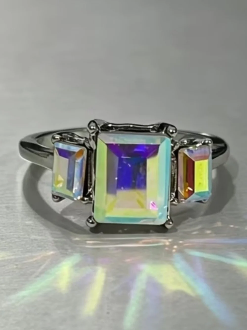 Silver-Setting Aurora Three-Stone Emerald-Cut Ring in Multicolor